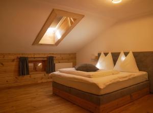 Postel nebo postele na pokoji v ubytování Apartments Wiglhof