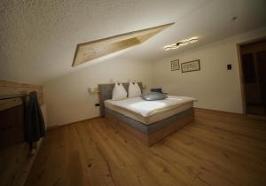 Postel nebo postele na pokoji v ubytování Apartments Wiglhof