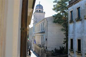 a view of a street with a building with a tower at DGA Loft in Padova