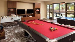 a billiard room with a pool table and a pool table at Westin Desert Willow Villas 1BR Apartment with Resort Access in Palm Desert +16 photos