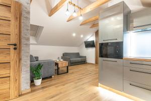 Kuchyňa alebo kuchynka v ubytovaní Bianco Apartamenty Laskowa - Zator