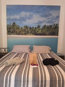 En eller flere senge i et værelse på Viva a Ilha mais Bela - 150m das praia do Viana e siriúba + 17 billeder
