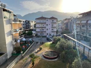 a view from a balcony of a city with buildings at Dafni Seaside Hotel in Leptokarya
