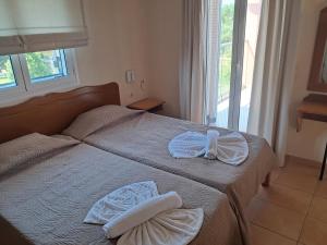 A bed or beds in a room at Villa Filia std