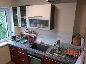 a kitchen with a sink and a counter top at Armas pesa Loo asumis in Loo +5 photos