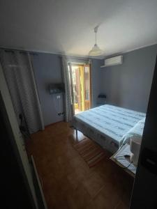 Postel nebo postele na pokoji v ubytování Su Campanile