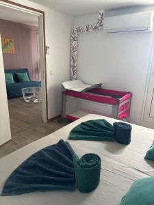 Letto o letti in una camera di Kay Louisette