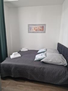 Postel nebo postele na pokoji v ubytování Ferienwohnung murihaus + 7 fotografií