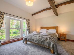 Ένα ή περισσότερα κρεβάτια σε δωμάτιο στο 3 bed in Caldbeck 88035