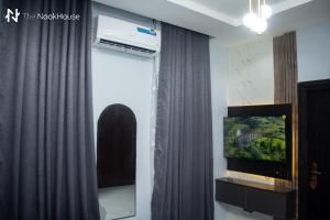 TV a/nebo společenská místnost v ubytování The NookHouse