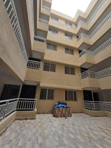 a large building with balconies on the side of it at 1BHK Service Apartment 307 in Pune