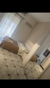 Ένα ή περισσότερα κρεβάτια σε δωμάτιο στο Galleria Colonna