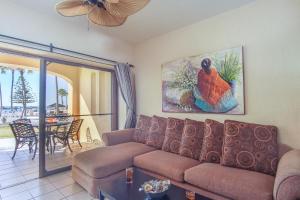 a living room with a couch and a table at Princesa De Penasco in Punta Penasco New