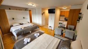 Ένα ή περισσότερα κρεβάτια σε δωμάτιο στο Studio 4103 Les Sources aux Bains d'Ovronnaz