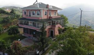 a large house on top of a hill at Trabzon Gürbulakta kiralık villa in Trabzon