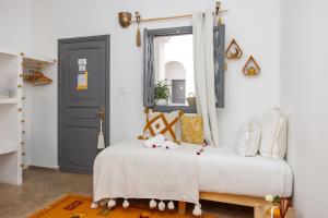 Postel nebo postele na pokoji v ubytování Riad Amya & Spa
