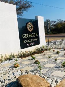 un cartello per il George B Boulevard Lodge di GEORGE B BOUTIQUE LODGE a Tzaneen