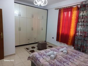 Ένα ή περισσότερα κρεβάτια σε δωμάτιο στο Ulliri 2