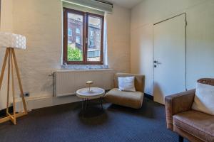 Χώρος καθιστικού στο Appartement atypique - coeur historique de Liège