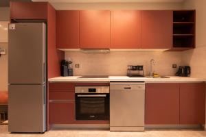 Η κουζίνα ή μικρή κουζίνα στο Studio 1BR Near CFC - 5 Stars Experience +7 φωτογραφίες