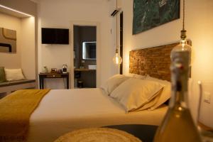 Postel nebo postele na pokoji v ubytování Bona A Vui Rooms