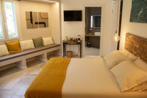 Postel nebo postele na pokoji v ubytování Bona A Vui Rooms