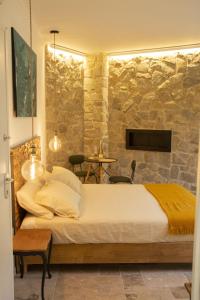 Postel nebo postele na pokoji v ubytování Bona A Vui Rooms