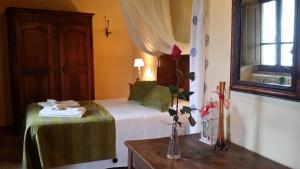 Postel nebo postele na pokoji v ubytování Agriturismo Saudon