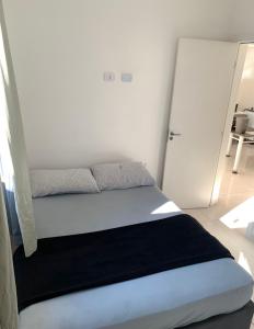 Postel nebo postele na pokoji v ubytování Casa no Litoral em Matinhos