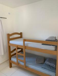 Postel nebo postele na pokoji v ubytování Casa no Litoral em Matinhos