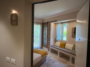Postel nebo postele na pokoji v ubytování Bona A Vui Rooms