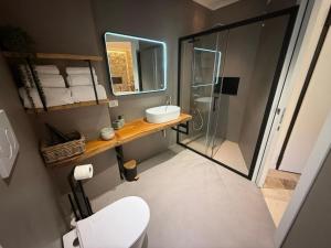 Koupelna v ubytování Bona A Vui Rooms + 22 fotografií