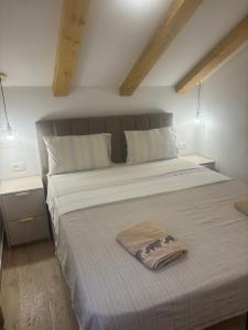 Ένα ή περισσότερα κρεβάτια σε δωμάτιο στο Srima Angel´s Apartments