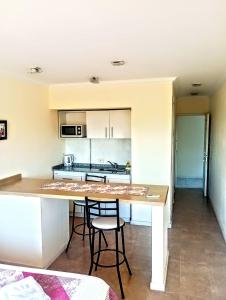 Kuchyň nebo kuchyňský kout v ubytování Rio Manso Apartamentos