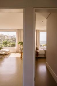 Ένα ή περισσότερα κρεβάτια σε δωμάτιο στο Maison De Plage