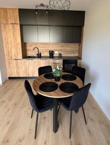 Kuchyň nebo kuchyňský kout v ubytování Słoneczny Apartament Karpicko