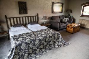 Łóżko lub łóżka w pokoju w obiekcie Apartamenty Za Murem