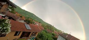 a rainbow over the side of a mountain at La Casetta in Ameno