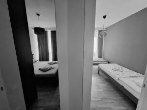 Ένα ή περισσότερα κρεβάτια σε δωμάτιο στο City Center