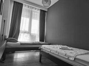 Ένα ή περισσότερα κρεβάτια σε δωμάτιο στο City Center