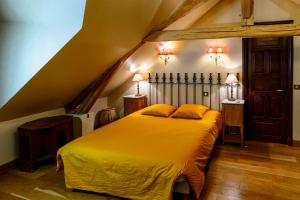 Katil atau katil-katil dalam bilik di Maison de charme près de Fontainebleau