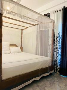 Letto o letti in una camera di Lake View Villa - Tangalle