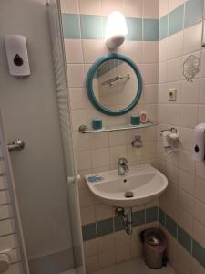Koupelna v ubytování Hotel Lindenthal