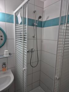 Koupelna v ubytování Hotel Lindenthal