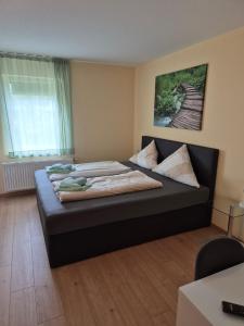 Postel nebo postele na pokoji v ubytování Hotel Lindenthal + 27 fotografií