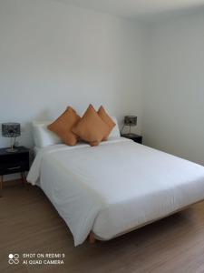 Ένα ή περισσότερα κρεβάτια σε δωμάτιο στο A Muradana