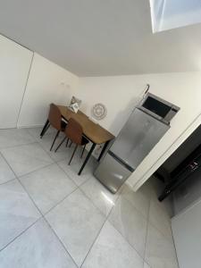 Kuchyň nebo kuchyňský kout v ubytování Conte Durini Apartments & Rooms
