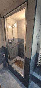 Kúpeľňa v ubytovaní Apartamenty w Centrum - Zakopane
