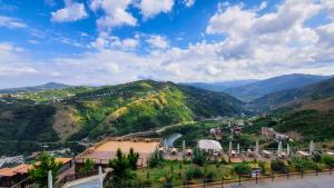 a view of a valley with a river and mountains at Sera Lake Resort Hotel Spa & Aparts in Trabzon