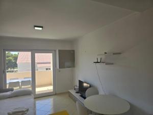 Photo de la galerie de l'établissement Apartment Paska, à Novalja